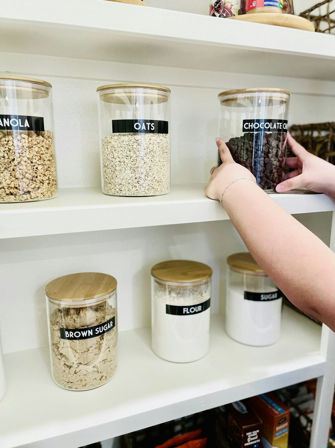 woman organizing pantry